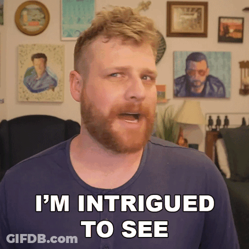 A Man Says I 'M Intrigued To See In Front Of Paintings GIF