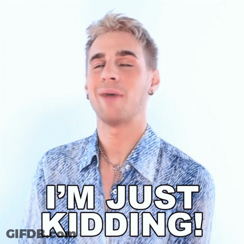 A Man Says I 'M Just Kidding In A Blue Shirt GIF