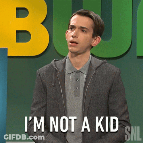 A Man Says I 'M Not A Kid In Front Of A Green Background GIF
