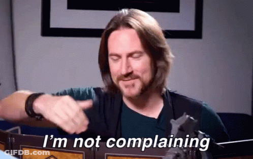 A Man Says I 'M Not Complaining In Front Of A Shield GIF