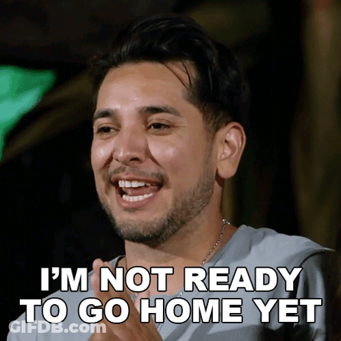 A Man Says I 'M Not Ready To Go Home Yet While Smiling GIF