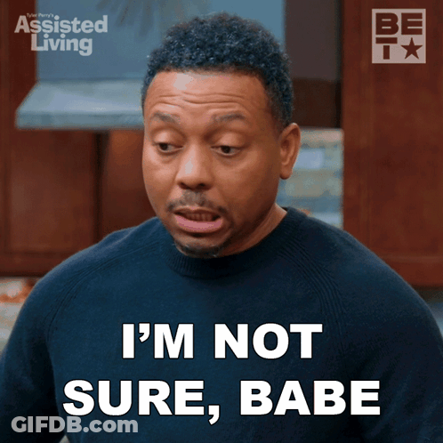 A Man Says " I 'M Not Sure Babe " While Wearing A Black Shirt GIF