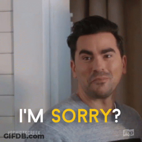 A Man Says I 'M Sorry With A Pop Logo In The Background GIF
