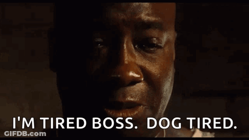A Man Says I 'M Tired Boss Dog Tired In A Dark Room GIF