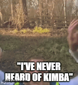 A Man Says " I 'Ve Never Heard Of Kimba " In Front Of A Fence GIF