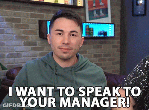A Man Says " I Want To Speak To Your Manager " In Front Of A Brick Wall GIF