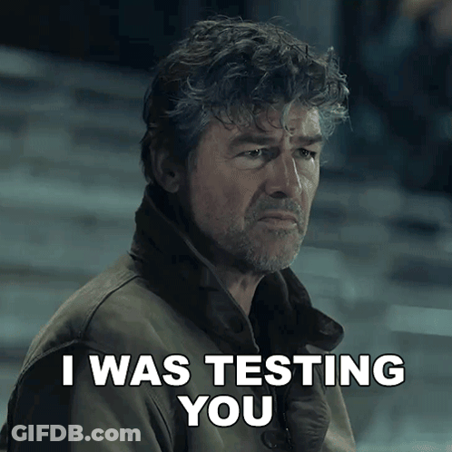 A Man Says I Was Testing You While Looking Down At Something GIF