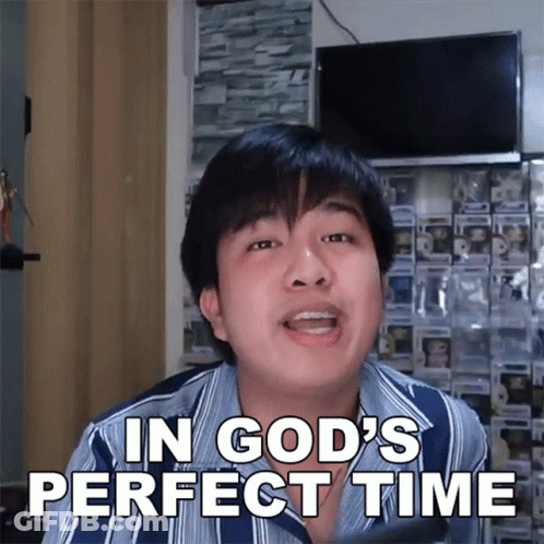 A Man Says In God 'S Perfect Time While Wearing A Striped Shirt GIF