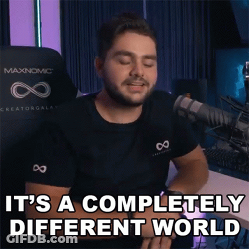 A Man Says It 'S A Completely Different World In Front Of A Microphone GIF