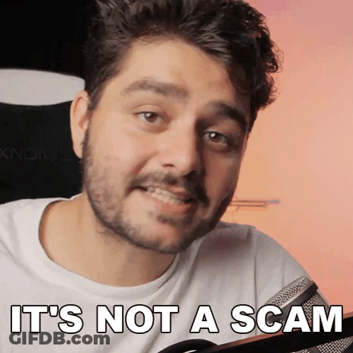 A Man Says It 'S Not A Scam In Front Of A Computer GIF