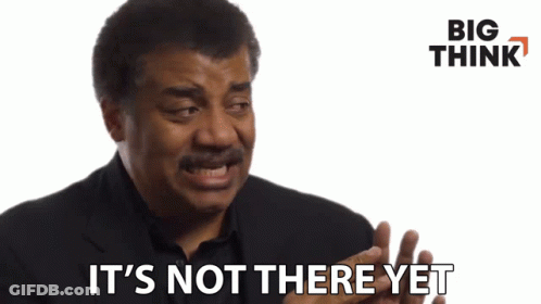 A Man Says " It 'S Not There Yet " In Front Of A White Background GIF