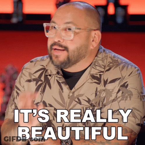 A Man Says It 'S Really Beautiful While Wearing Glasses And A Shirt GIF