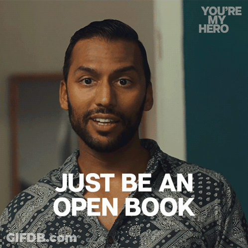 A Man Says " Just Be An Open Book " In A You 'Re My Hero Advertisement GIF