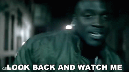 A Man Says Look Back And Watch Me In A Blurry Photo GIF