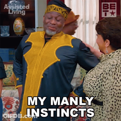 A Man Says My Manly Instincts While A Woman Looks On GIF