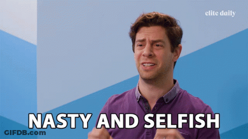 A Man Says " Nasty And Selfish " In Front Of A Blue Wall GIF