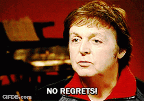 A Man Says No Regrets In Front Of A Piano GIF