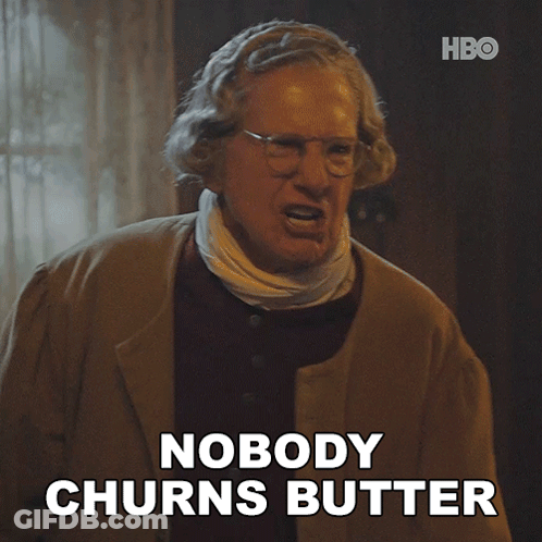 A Man Says Nobody Churns Butter In Front Of A Hbo Sign GIF
