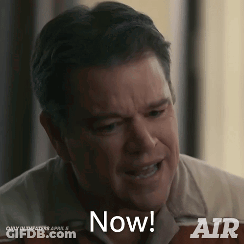 A Man Says " Now " In Front Of A Sign That Says Air GIF