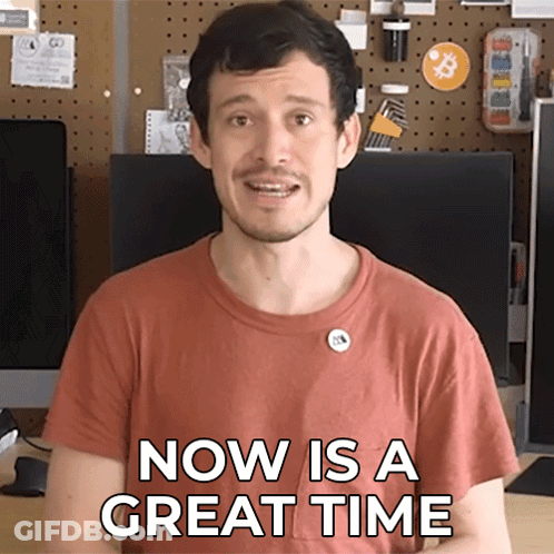A Man Says Now Is A Great Time In Front Of A Computer Monitor GIF
