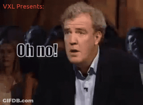 A Man Says Oh No In Front Of A Crowd Of People GIF