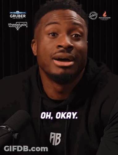 A Man Says Oh Okay In Front Of A Gruber Advertisement GIF