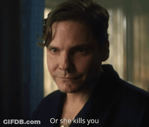 A Man Says " Or She Kills You " In Front Of A Window GIF