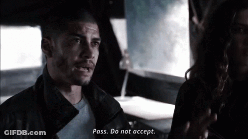 A Man Says Pass Do Not Accept While Talking To Another Man GIF