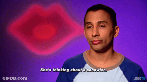 A Man Says She 'S Thinking About A Sandwich In Front Of A Pink Lips GIF
