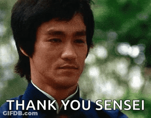 A Man Says Thank You Sensei In Front Of A Blurry Background GIF