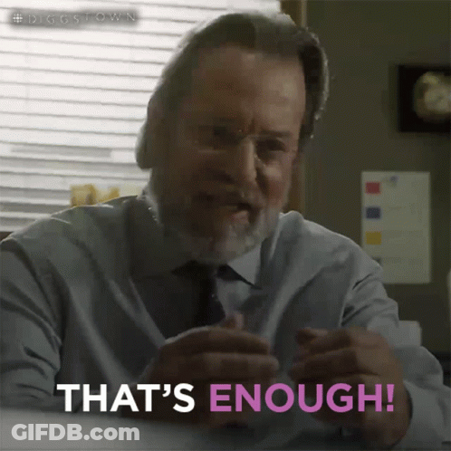 A Man Says That 'S Enough While Sitting At A Table GIF