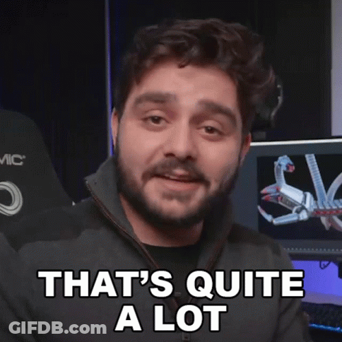 A Man Says That 'S Quite A Lot In Front Of A Computer Monitor GIF