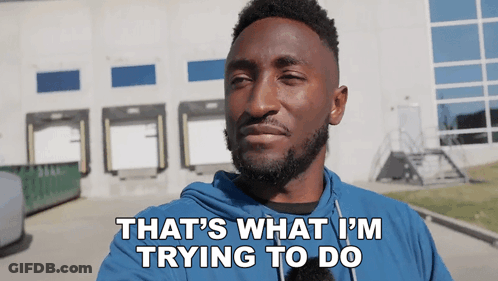 A Man Says That 'S What I 'M Trying To Do In Front Of A Building GIF