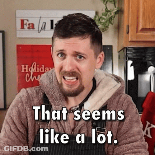 A Man Says That Seems Like A Lot In Front Of A Christmas Sign GIF