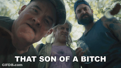 A Man Says That Son Of A Bitch While Standing Next To Two Other Men GIF