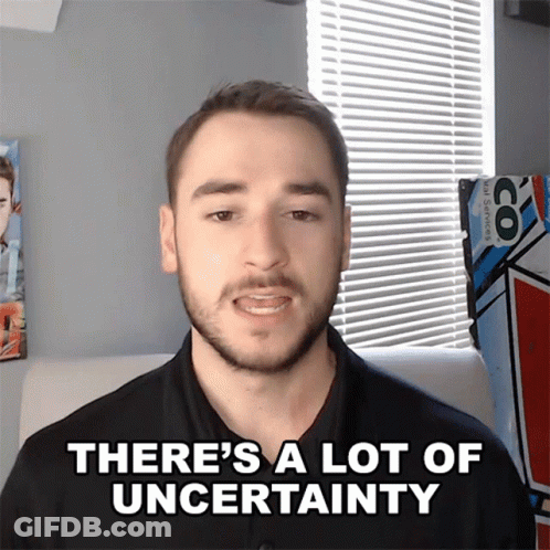 A Man Says " There 'S A Lot Of Uncertainty " In Front Of A Window GIF