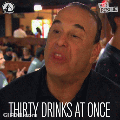 Man Saying Thirty Drinks At Once In Bar GIF