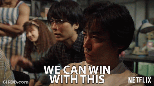 A Man Says We Can Win With This In Front Of A Group Of People GIF