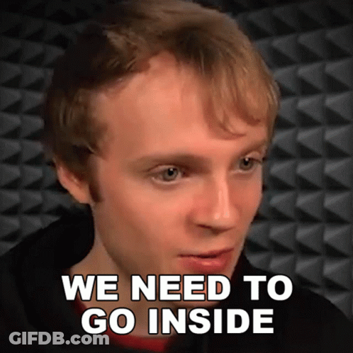 A Man Says " We Need To Go Inside " While Looking At The Camera GIF