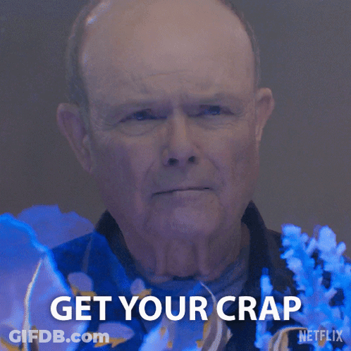 A Man Says We 'Re Going Home In Front Of A Blue Background GIF