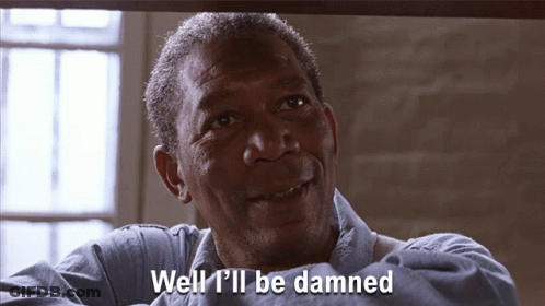 A Man Says " Well I 'Ll Be Damned " In A Prison Cell GIF