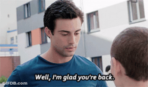 A Man Says Well I 'M Glad You 'Re Back While Talking To Another Man GIF