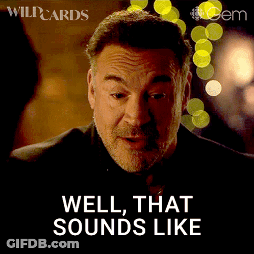 A Man Says Well That Sounds Like In Front Of A Blurred Background GIF