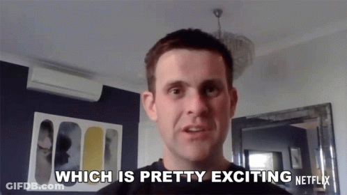 A Man Says " Which Is Pretty Exciting Netflix " In Front Of A Mirror GIF
