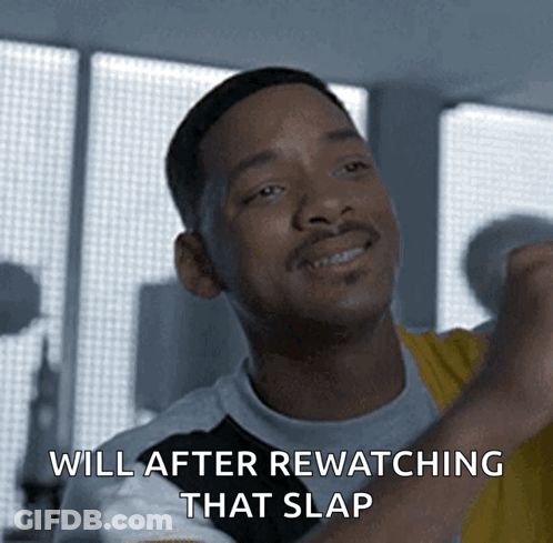 A Man Says " Will After Rewatching That Slap " In Front Of A Window GIF