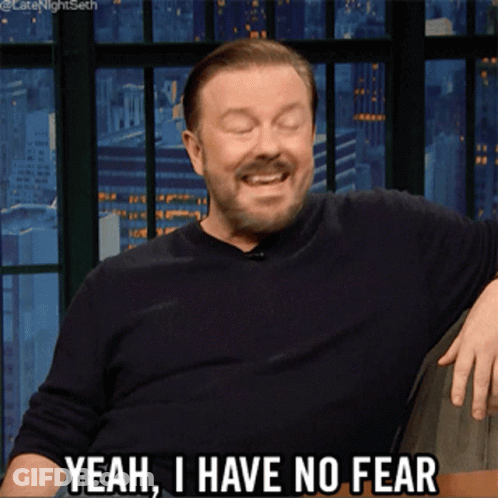 A Man Says Yeah I Have No Fear In Front Of A Window GIF