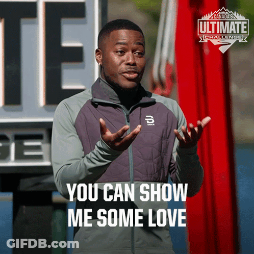 A Man Says You Can Show Me Some Love In Front Of A Sign That Says Ultimate Challenge GIF