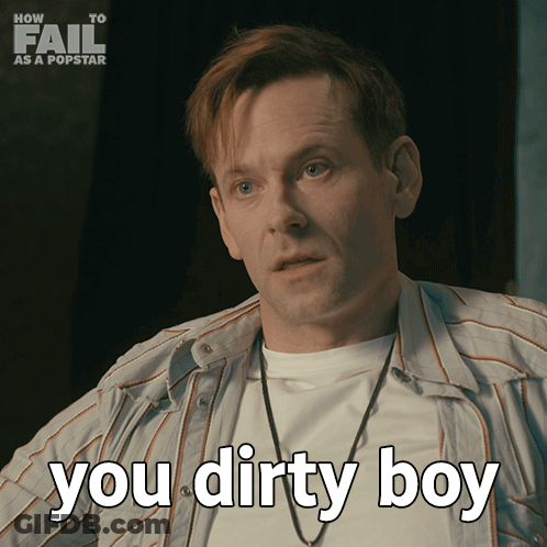 A Man Says " You Dirty Boy " In Front Of A How To Fail As A Popstar Poster GIF