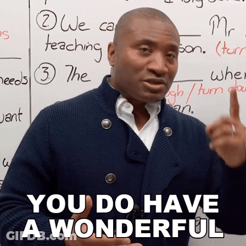 A Man Says You Do Have A Wonderful In Front Of A Whiteboard GIF