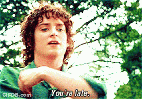 A Man Says You 'Re Late In Front Of Trees GIF